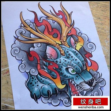 时髦很帅的一枚豹头纹身