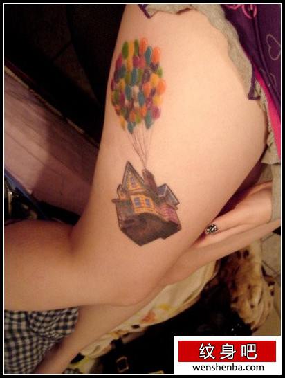 女人腿部气球与房子纹身