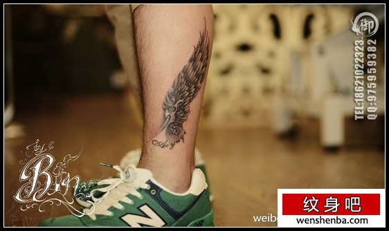 男性腿部权威的黑灰机械翅膀纹身